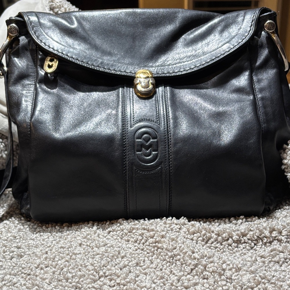 Marino Orlandi - spacious black leather bag. 10 inches wide x 10.5 inches high-